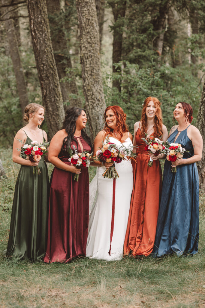 Bridesmaids with their Montana wedding florals