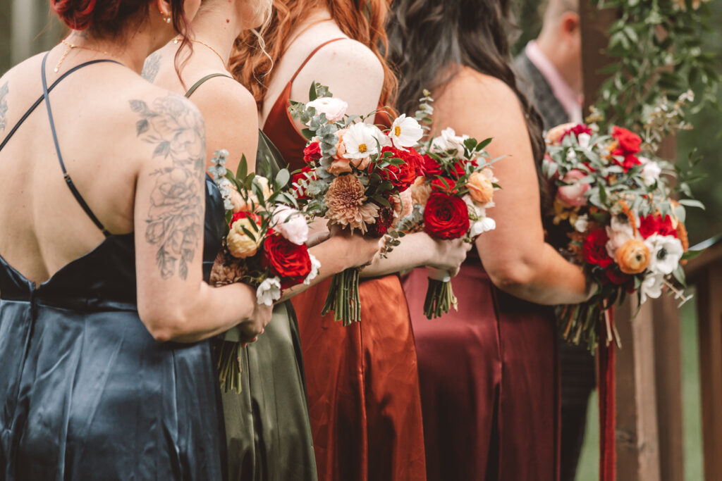 Bridesmaids holding their Montana wedding florals