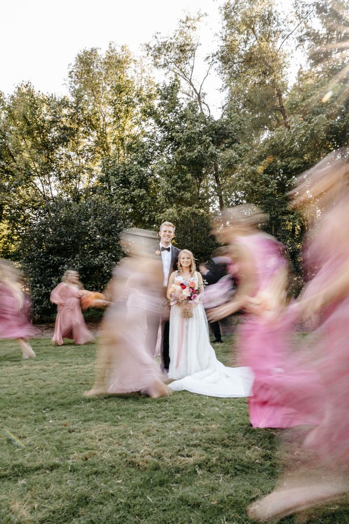 Nashville newlyweds with wedding flowers